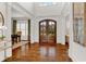 Spacious foyer with gleaming hardwood floors and high ceilings at 2325 Manor Creek Ct, Cumming, GA 30041