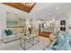 Open concept living room and kitchen area with decorative lighting and luxury furnishings at 2325 Manor Creek Ct, Cumming, GA 30041