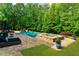 Sparkling pool and spa with patio creates a backyard getaway at 2325 Manor Creek Ct, Cumming, GA 30041