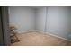 Empty bonus room with neutral carpet; ready for your personal touch at 2476 Suwanee Pointe Dr, Lawrenceville, GA 30043