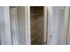 Walk in closet offers ample storage with multiple shelves for easy organization at 2476 Suwanee Pointe Dr, Lawrenceville, GA 30043