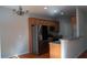 Spacious kitchen featuring granite counters, stainless appliances, and wood cabinets at 2476 Suwanee Pointe Dr, Lawrenceville, GA 30043