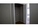 A gray utility closet with bi-fold doors and a hookup for a washing machine at 2476 Suwanee Pointe Dr, Lawrenceville, GA 30043