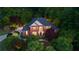 Charming brick home with well-maintained landscaping, dark roof, and inviting entrance at 3102 Royal Troon, Woodstock, GA 30189