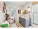Bathroom with gray vanity and a view into the adjacent bedroom offers a tranquil retreat at 621 Mcgruder Ne St, Atlanta, GA 30312