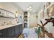 Stylish bathroom with a double vanity, patterned tile floors, and a subway tiled shower at 621 Mcgruder Ne St, Atlanta, GA 30312