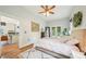 Sunlit bedroom featuring hardwood floors and access to the outdoors, blending indoor and outdoor living at 621 Mcgruder Ne St, Atlanta, GA 30312