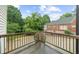 Balcony with black railing overlooking parking and lawn at 146 Mount Paran Ne Rd, Atlanta, GA 30342