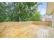Spacious wooden deck overlooking the backyard and lush landscaping at 146 Mount Paran Ne Rd, Atlanta, GA 30342
