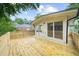 Wide angle view of a wood deck with house access and backyard views at 146 Mount Paran Ne Rd, Atlanta, GA 30342