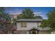 Two-story home with white siding and black trim, surrounded by mature trees at 146 Mount Paran Ne Rd, Atlanta, GA 30342