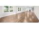 Open floor plan featuring hardwood floors, bright windows, and modern staircase at 146 Mount Paran Ne Rd, Atlanta, GA 30342