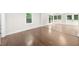 Living room featuring hardwood floors, a window, and an open-concept design at 146 Mount Paran Ne Rd, Atlanta, GA 30342