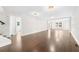 Expansive living room with hardwood floors, staircase, and white walls at 146 Mount Paran Ne Rd, Atlanta, GA 30342