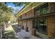 A two-story brick home has a patio and a backyard that is fenced at 201 E Simon Nw Ter, Atlanta, GA 30318