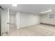 This finished basement has carpeted floors, recessed lights, neutral walls and a large closet at 201 E Simon Nw Ter, Atlanta, GA 30318