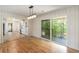 View of open concept living space with access to a kitchen and outdoor deck at 201 E Simon Nw Ter, Atlanta, GA 30318