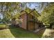 This brick home has multiple balconies and a fenced-in backyard at 201 E Simon Nw Ter, Atlanta, GA 30318
