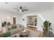 Bright living room featuring hardwood floors, neutral tones and ceiling fan at 201 E Simon Nw Ter, Atlanta, GA 30318