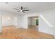 Spacious living area with wood floors, a ceiling fan, and an open layout at 201 E Simon Nw Ter, Atlanta, GA 30318