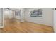 Bright room features hardwood floors, glass french doors and large window overlooking front yard at 201 E Simon Nw Ter, Atlanta, GA 30318