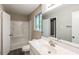Bathroom featuring vanity, shower/tub, and neutral finishes at 8857 Ashwood Dr, Riverdale, GA 30274