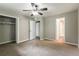 Spacious bedroom with neutral walls and closet access at 8857 Ashwood Dr, Riverdale, GA 30274