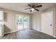 Dining area featuring wood-look floors and sliding glass doors to a deck at 8857 Ashwood Dr, Riverdale, GA 30274