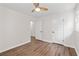 This bedroom showcases wood-look floors, two closets, a ceiling fan, and natural light at 10 Casey Ln, Cartersville, GA 30121