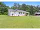 Well-kept home with a covered porch and manicured lawn, highlighting its curb appeal and landscaping at 10 Casey Ln, Cartersville, GA 30121