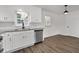 Bright kitchen features stainless steel appliances, white cabinets, and modern countertops at 10 Casey Ln, Cartersville, GA 30121