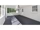 Bright sunroom with lots of windows, whitewashed brick walls, and natural light at 10 Casey Ln, Cartersville, GA 30121