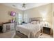 Bedroom with neutral carpet and modern furniture at 132 Eagles Club Dr, Stockbridge, GA 30281