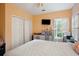 Bedroom with neutral carpet and modern furniture at 132 Eagles Club Dr, Stockbridge, GA 30281