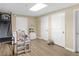 Finished basement playroom features durable floors, ample lighting, and plenty of space for activities at 219 Eagles Landing Way, Mcdonough, GA 30253