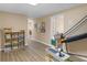 Finished basement recreation area with games, toys, and durable floors at 219 Eagles Landing Way, Mcdonough, GA 30253