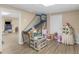 Finished basement area with games, toys and ample space for activities at 219 Eagles Landing Way, Mcdonough, GA 30253
