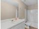 Well-lit bathroom with white sink and vanity, plus combined shower and tub at 219 Eagles Landing Way, Mcdonough, GA 30253