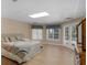 Bright bedroom featuring a comfortable bed, warm color tones, and private outdoor access at 219 Eagles Landing Way, Mcdonough, GA 30253