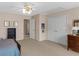 Bright bedroom with ample closet space and a ceiling fan for added comfort at 219 Eagles Landing Way, Mcdonough, GA 30253