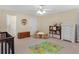 Bedroom area with play area featuring a table, chairs, toys, and storage solutions at 219 Eagles Landing Way, Mcdonough, GA 30253