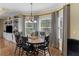 Dining area with hardwood floors and natural lighting at 219 Eagles Landing Way, Mcdonough, GA 30253