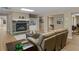 Inviting living room with stone fireplace, built-in shelving, and comfortable seating for relaxation at 219 Eagles Landing Way, Mcdonough, GA 30253