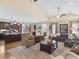 Open concept living room showcasing dark wood cabinets and hardwood floors at 219 Eagles Landing Way, Mcdonough, GA 30253