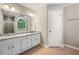 Bright bathroom featuring double vanity, granite countertops, and walk-in shower at 2312 Mahogany Glen Pl, Lawrenceville, GA 30043