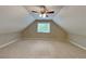 Spacious bedroom features neutral walls, carpet, and vaulted ceiling with a window at 2312 Mahogany Glen Pl, Lawrenceville, GA 30043