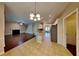 Open kitchen layout seamlessly connects to the breakfast nook and living area beyond at 2312 Mahogany Glen Pl, Lawrenceville, GA 30043