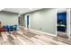 Finished basement featuring a large open space with durable floors and access to additional rooms at 5006 Dekalb Way, Stone Mountain, GA 30087