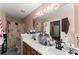 Bathroom featuring a double vanity, a tub and a shower at 8436 Cyprus Ridge Way, Douglasville, GA 30134