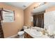 Bathroom featuring tile flooring, a vanity and a shower with patterned curtains at 8436 Cyprus Ridge Way, Douglasville, GA 30134